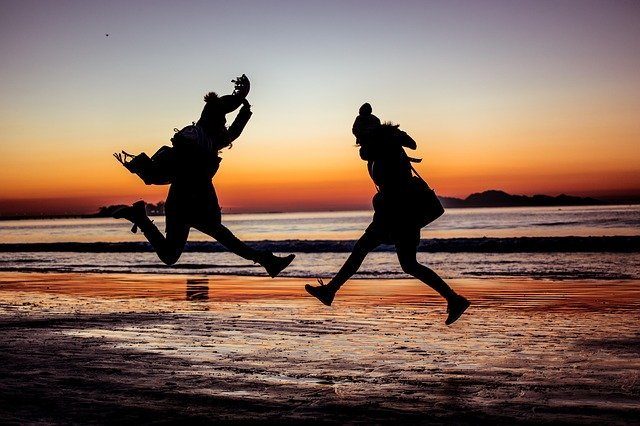 Two Woman Jumping