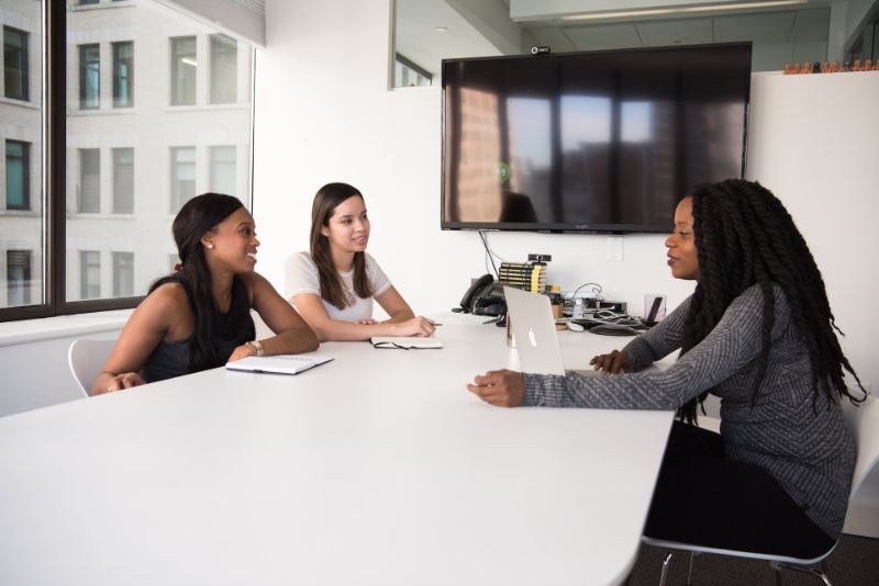 Three women in a meeting