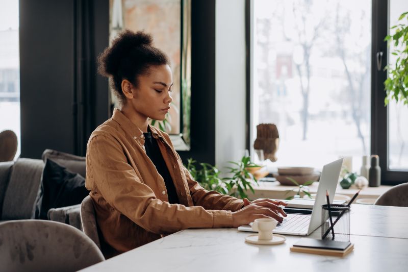 a woman working on her laptop