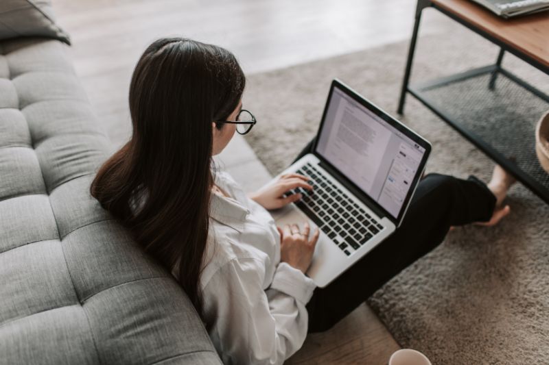 a girl working on her laptop