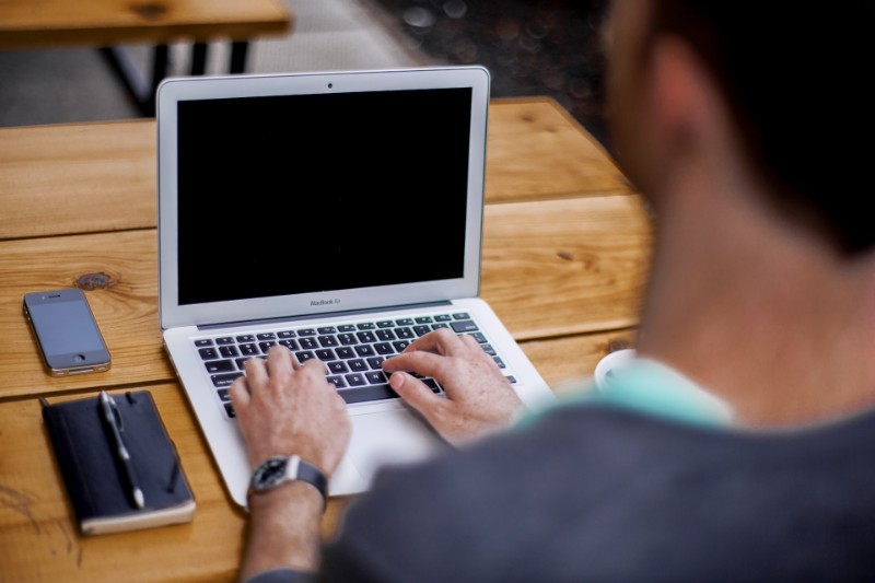 someone typing on a computer