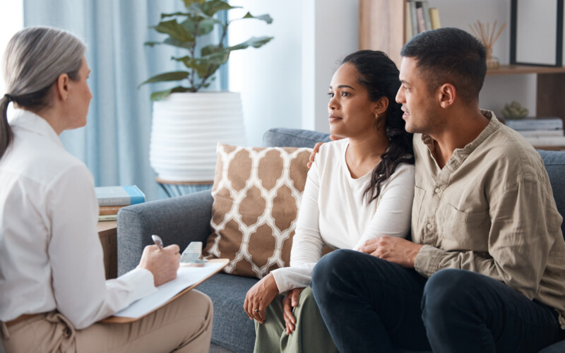 Therapist talking to a couple