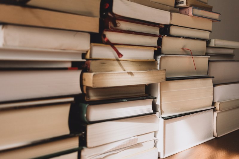 a bunch of books on the table