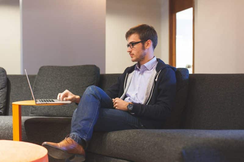 A Self-Employed Worker on His Laptop
