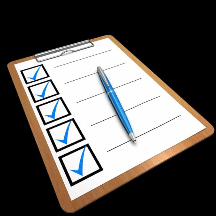 Checklist and pen on a clipboard