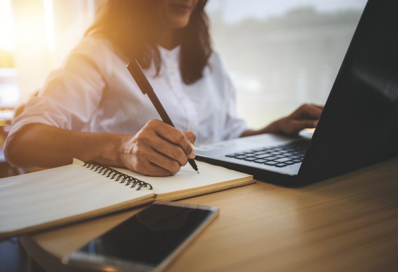 Women doing research on her laptop