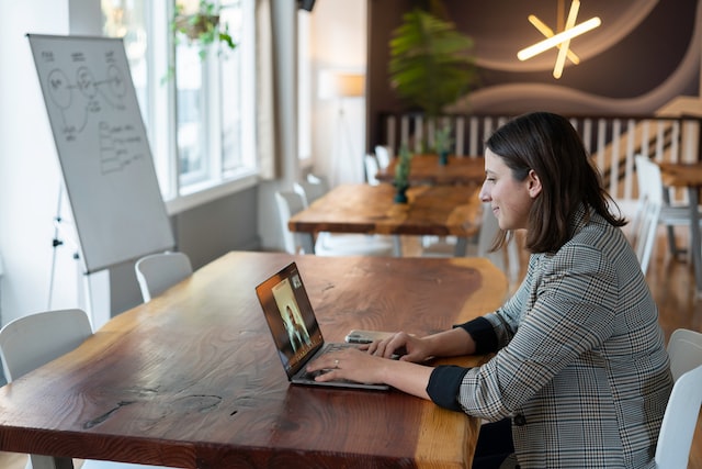 Woman on a conference call in an open office