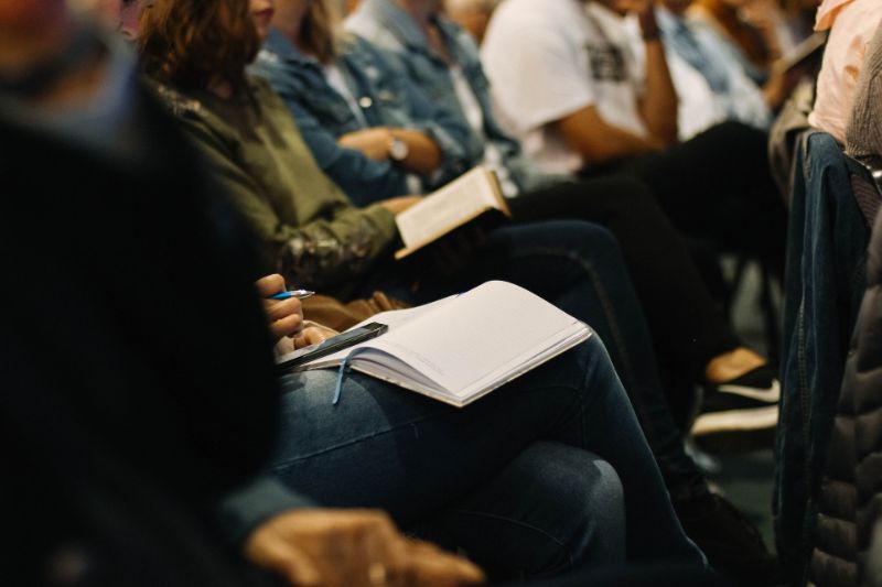 A group of people listening