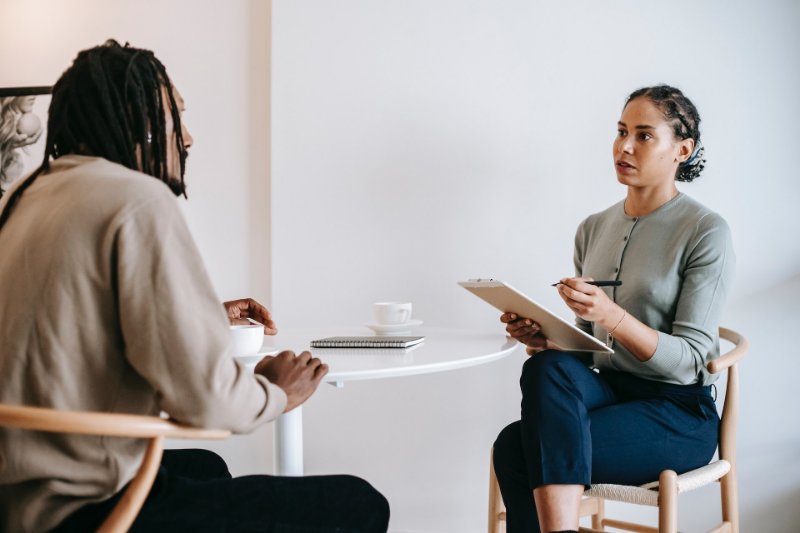 A man and woman discussing something