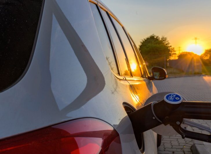 Car Gas Up During Sunset