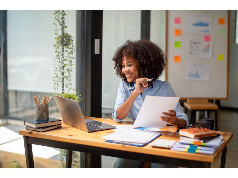 Cute woman choosing her side hustle online