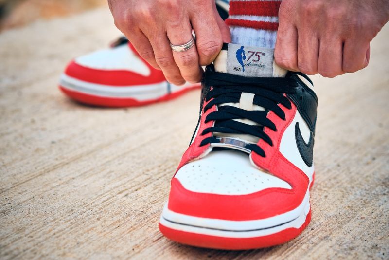 On-feet Nike Dunk Low EMB NBA 75th Anniversary Chicago colorway sneakers