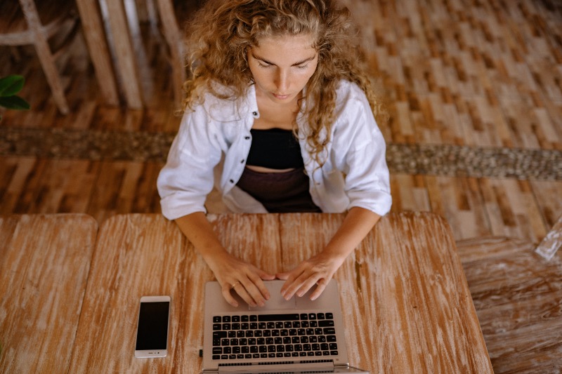 Woman Using Laptop