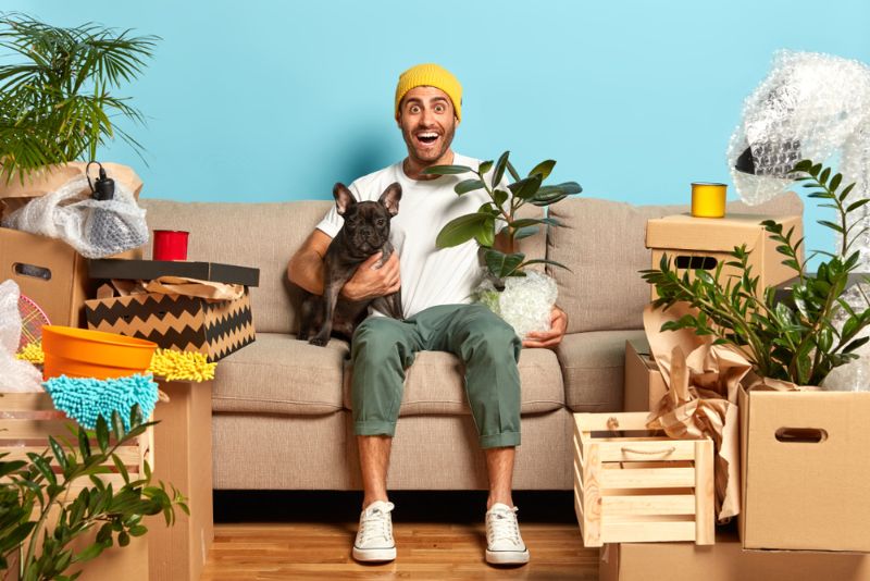 Man with dog and plants