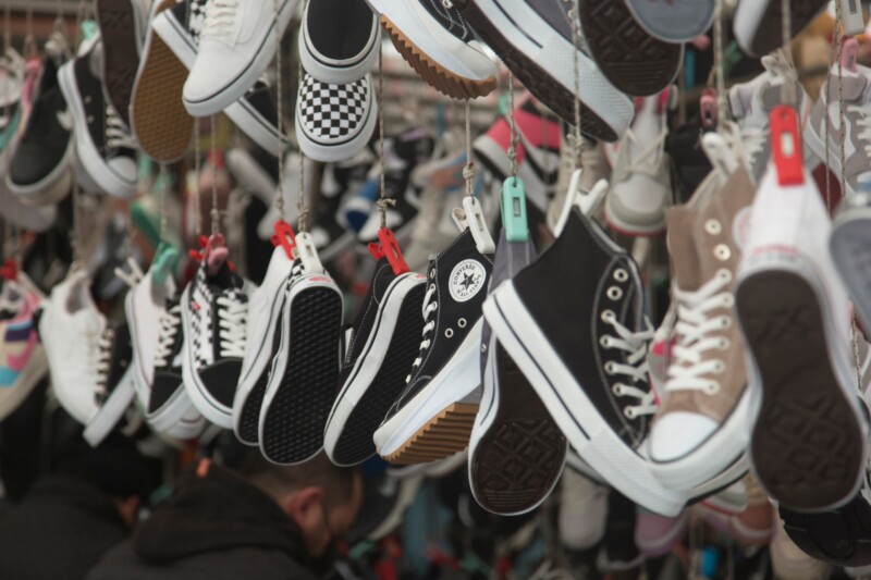 Close-up of imitation shoes for sale at the street market