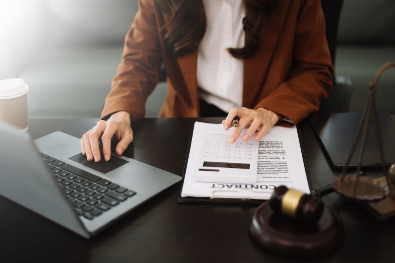 Woman drafting an investment contract