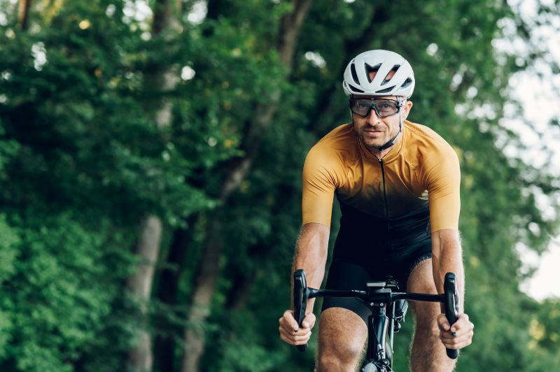 Bike rider in yellow with complete gear