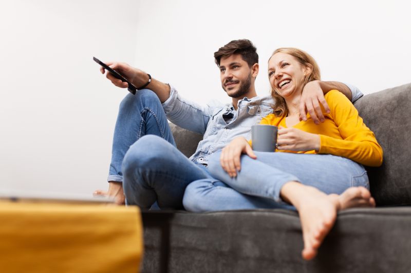 Couple sitting in their home