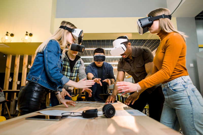 Group Wearing Virtual Reality Goggles