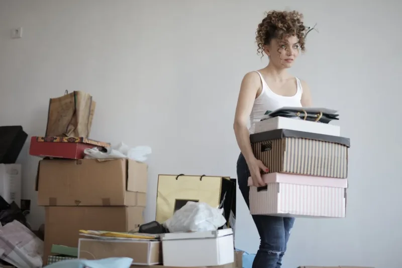 A lady packing items for flipping