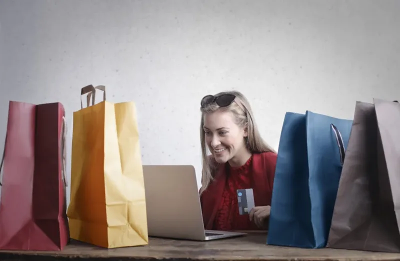 A lady making purchases with credit card