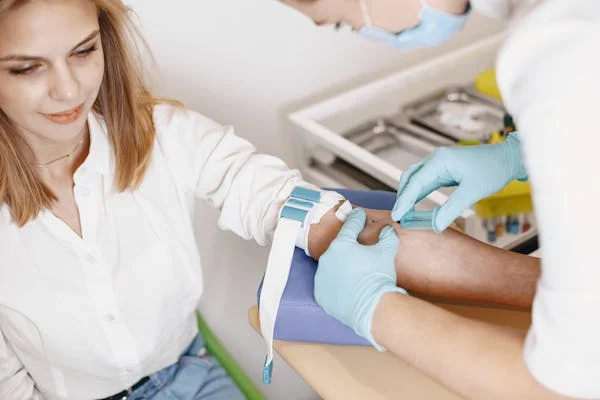 A lady donating blood