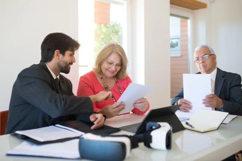 A woman signing an inheritance document